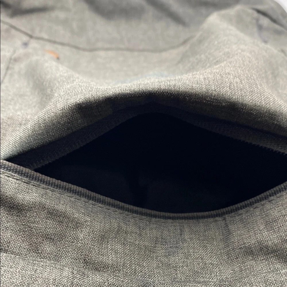 Gray Modern Backpack With Adjustable Straps And Bronze Metal Hardware